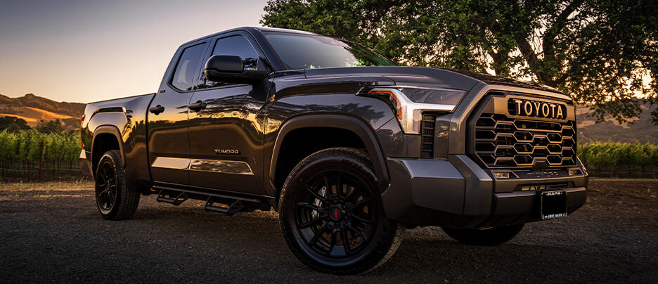 Toyota auto repair service near me in Colorado Springs, CO with Legend Motor Works. Low-angle shot of a 2022 Toyota Tundra SR5 Double Cab Four Wheel Drive with TRD Pro grill, showcasing quality repair and maintenance services.